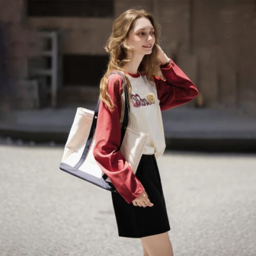 唐狮2026秋季新款长袖T恤女字母撞色插肩袖小熊学生宽松休闲上衣