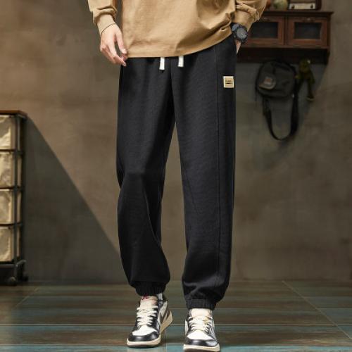 唐狮25秋季新款男休闲裤抽绳针织束腿潮流时尚设计黑色运动长裤