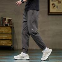 唐狮2026春秋季男士休闲长裤设计显瘦宽松束脚裤百搭休闲今年流行