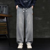 唐狮2026秋冬新款男牛仔裤宽松侧边细节皮标牛仔直筒复古潮流